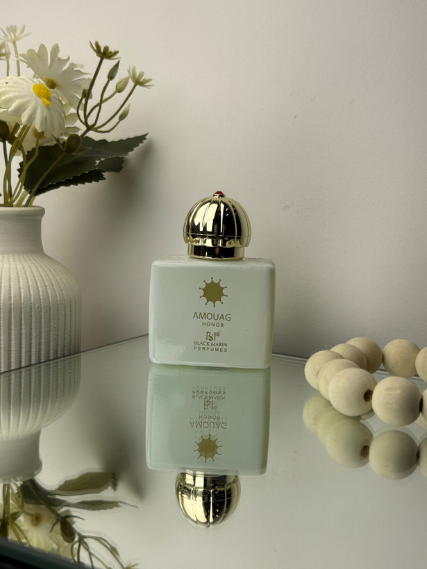 عطر جیبی زنانه رایحه امواژ انر برند بلک مارین حجم 25 میل