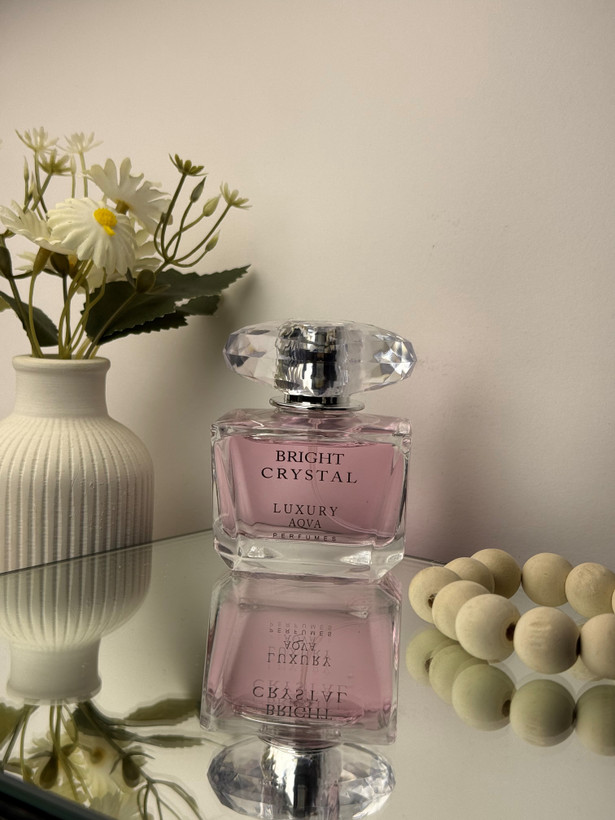 عطر جیبی زنانه رایحه ورساچه صورتی برایت کریستال برند لاکچری اکوا حجم 50 میل